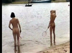 Slim nude nubiles frolicking badminton