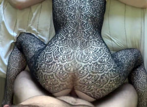 Young woman coed in luxurious fishnets..